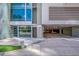 The building entrance shows a contemporary design with an entrance to the parking garage at 111 N 12Th St # 1614, Tampa, FL 33602