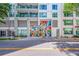 Street-level view of modern building with vibrant mural on a garage door at 111 N 12Th St # 1614, Tampa, FL 33602