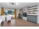 Comfortable dining room featuring a designer-style fireplace and built-in shelving at 125 Siobhan Ave, Tampa, FL 33613