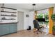 Bright office space with custom shelving, natural light, and a functional desk setup at 125 Siobhan Ave, Tampa, FL 33613