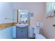 Bathroom in need of repair features a modern sink and vanity at 13329 N Armenia Ave, Tampa, FL 33613