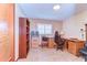 Bedroom with wood floors offers a neutral color palette and great natural light at 13329 N Armenia Ave, Tampa, FL 33613