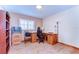 Bedroom with wood floors offers a neutral color palette and great natural light at 13329 N Armenia Ave, Tampa, FL 33613