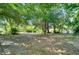 Spacious lot offers mature trees, natural beauty, and endless possibilities for your custom home at 13329 N Armenia Ave, Tampa, FL 33613
