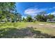 Expansive, well-maintained front yard offering plenty of space and a serene atmosphere at 13329 N Armenia Ave, Tampa, FL 33613