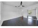 Neutral bedroom with hardwood flooring, ceiling fan, closet and ample space at 136 30Th N Ave, St Petersburg, FL 33704