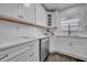 Bright white kitchen with modern appliances and plenty of cabinet space at 136 30Th N Ave, St Petersburg, FL 33704