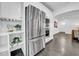 Modern kitchen featuring stainless steel refrigerator and built-in ovens at 136 30Th N Ave, St Petersburg, FL 33704