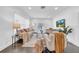 Inviting living room featuring neutral furniture, dark hardwood floors, and bright, airy lighting at 136 30Th N Ave, St Petersburg, FL 33704