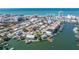 Stunning aerial view of a waterfront community with beach access and canal access at 145 174Th Terrace E Dr, Redington Shores, FL 33708