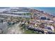 Scenic aerial perspective highlighting a waterfront neighborhood with canals, docks, and easy access to the bay at 145 174Th Terrace E Dr, Redington Shores, FL 33708