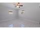 Bedroom featuring modern lighting, flooring and windows at 145 174Th Terrace E Dr, Redington Shores, FL 33708