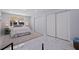 A bright bedroom featuring a large closet, neutral walls, and light filled windows at 145 174Th Terrace E Dr, Redington Shores, FL 33708