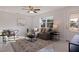 Cozy living room featuring stylish decor and a sunlit window at 145 174Th Terrace E Dr, Redington Shores, FL 33708