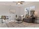 Bright and airy living room with contemporary furnishings and a view to the outside at 145 174Th Terrace E Dr, Redington Shores, FL 33708