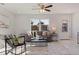 Comfortable living room offering a cozy atmosphere with ample natural light at 145 174Th Terrace E Dr, Redington Shores, FL 33708