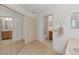 En-suite bathroom with a walk-in closet, a private toilet and a sink with vanity at 1472 Overland Dr, Spring Hill, FL 34608