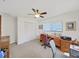 Bedroom with a ceiling fan, large closet, and a window providing natural light at 1472 Overland Dr, Spring Hill, FL 34608
