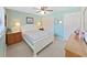 Cozy bedroom featuring a bed, ceiling fan, closet, and neutral decor at 1472 Overland Dr, Spring Hill, FL 34608