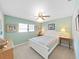 Bedroom featuring a queen-sized bed with neutral walls and ceiling fan at 1472 Overland Dr, Spring Hill, FL 34608