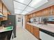 Functional kitchen features stainless steel appliances and plenty of counter space at 1472 Overland Dr, Spring Hill, FL 34608
