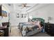 Bedroom boasts a tray ceiling, ceiling fan, and a comfortable layout at 1614 E Nome St, Tampa, FL 33604