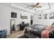 Bedroom showcasing a TV, tray ceiling, and stylish decor with a comfortable ambiance at 1614 E Nome St, Tampa, FL 33604