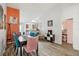 Open-concept dining area with tile floors, stylish decor, and seamless access to the kitchen at 1614 E Nome St, Tampa, FL 33604