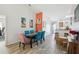 Cozy dining area with elegant furnishings, tile floors, and an open layout to the kitchen at 1614 E Nome St, Tampa, FL 33604