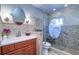 Well-maintained bathroom featuring a tiled glass door shower, modern fixtures, and ample vanity space at 16247 Fringe Tree Dr, Spring Hill, FL 34610
