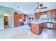 Large, open kitchen with a central island, modern appliances, and plenty of storage space, great for entertaining at 16247 Fringe Tree Dr, Spring Hill, FL 34610