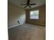 A vacant bedroom featuring carpeting, neutral wall colors and a single window at 2140 Redleaf Dr, Brandon, FL 33510