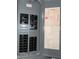 Close up of an old style Square D electric breaker panel with cover notes at 2140 Redleaf Dr, Brandon, FL 33510