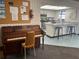 Community room with a piano and a view of the kitchen at 2583 Countryside Blvd # 3102, Clearwater, FL 33761