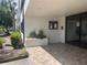 Condo entrance with Directory board and doorway, and attractive tile walkway at 2583 Countryside Blvd # 3102, Clearwater, FL 33761
