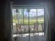 Enjoy a private patio with views of lush landscaping and comfortable seating arrangements at 2583 Countryside Blvd # 3102, Clearwater, FL 33761