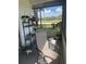 Cozy patio with comfortable seating and view of tropical landscaping for ultimate relaxation at 2583 Countryside Blvd # 3102, Clearwater, FL 33761