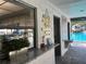 View of the community pool area with signage and an outdoor counter area at 2583 Countryside Blvd # 3102, Clearwater, FL 33761