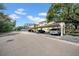 Exterior of covered carport parking area with available parking spots at 2612 Pearce Dr # 209, Clearwater, FL 33764