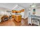 Well-equipped kitchen with granite countertops, an island, and modern appliances at 2612 Pearce Dr # 209, Clearwater, FL 33764
