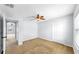 Bedroom with a window letting in natural light, ceiling fan and large closet at 312 Taxter Run Ln, Valrico, FL 33594