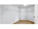 Walk-in closet featuring ample shelving and carpeting at 312 Taxter Run Ln, Valrico, FL 33594