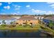Aerial view of backyard with patio and pond at 3214 Painted Blossom Ct, Lutz, FL 33558