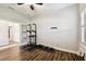 Bonus room with wood flooring, ample natural light, and pull up bar at 3822 Balcony Breeze Dr, Land O Lakes, FL 34638