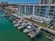 Waterfront condo complex featuring boat slips, gorgeous water views and a community pool at 415 Island Way # 205, Clearwater Beach, FL 33767