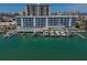 Stunning waterfront condos with boat slips, pool, and city views make this an amazing property at 415 Island Way # 205, Clearwater Beach, FL 33767