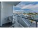 Balcony with seating offers views of the waterfront and dock areas at 415 Island Way # 205, Clearwater Beach, FL 33767