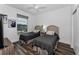 This bedroom offers two twin beds, wood-look floors and a window with a beautiful view of the city at 415 Island Way # 205, Clearwater Beach, FL 33767