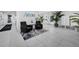 Bright lobby with seating, tile floor, natural light, and the Azure logo at 415 Island Way # 205, Clearwater Beach, FL 33767