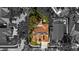 Overhead view of property featuring solar panels, fenced-in yard, and lush, mature landscaping at 4508 Compass Oaks Dr, Valrico, FL 33596